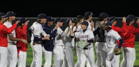 Baseball Players Celebrating End of Game on Field