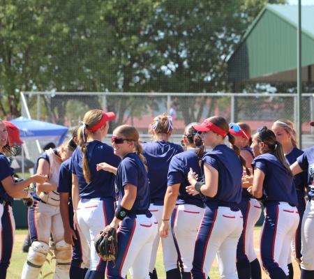Softball Players Celebrating After Game